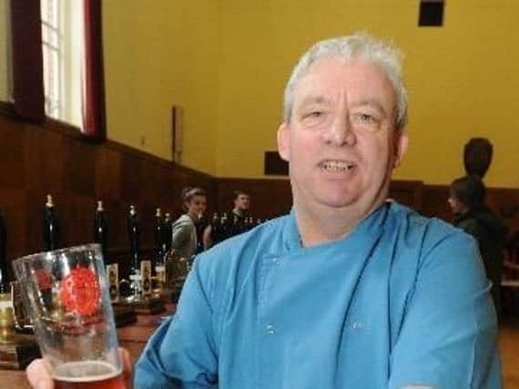 Town councillor Vince Pridden enjoys a pint at one the previous Padiham Beer Festivals