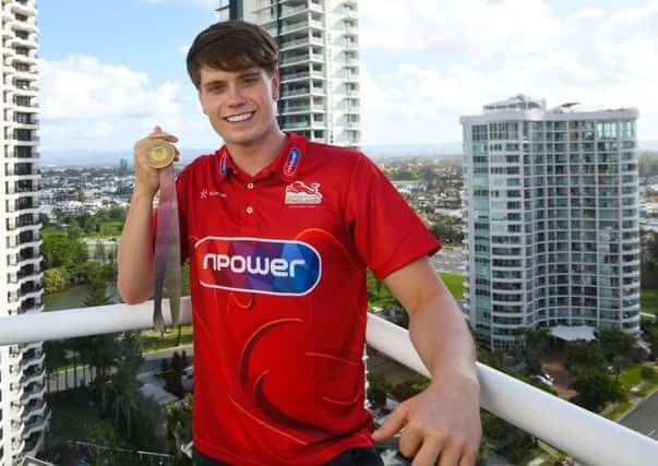 GOLD COAST, AUSTRALIA - APRIL 06:  Tom Hamer of England poses with his Gold Medal at the Team England Hotel in Main Beach on day two of the 2018 Commonwealth Games on April 6, 2018 on the Gold Coast, Australia. Tom won gold in the  S14 200m Freestyle event. (Photo by Vince Caligiuri/Getty Images)