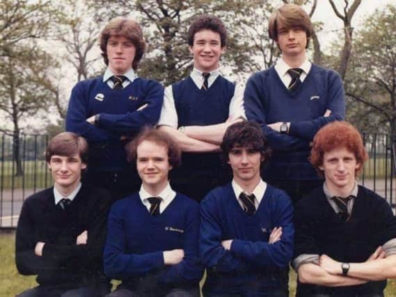 This old photograph, that belongs to former student Andy Duxbury (pictured back row far left) shows pupils posing for the photographer at St Theodore's RC High School, Burnley around 1983.