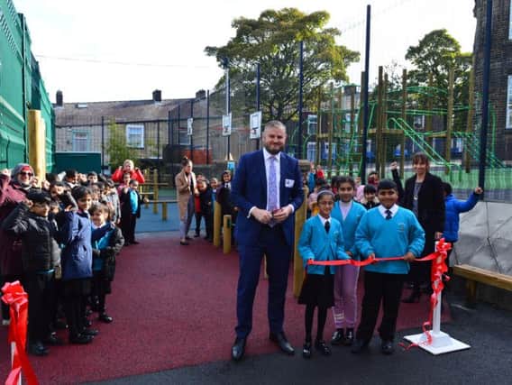 Andrew Stepehenson MP opening the new playground equipment.