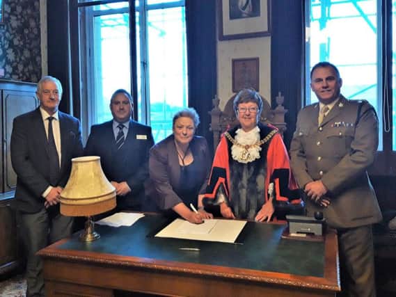 (Left to right) Coun. Charlie Briggs, leader of the council, Wing Commander Chris Ashworth, regional employer engagement director for the Reserve Forces & Cadets Association, Coun. Cosima Towneley, Mayor of Burnley Coun. Anne Kelly and Lt Col. Jim Dowle from headquarters North-West.