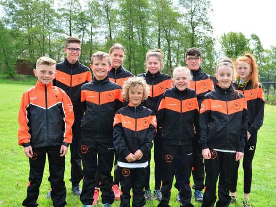 Clayton Harriers juniors looking very smart in some of their new kit bought thanks to a grant from the People's Postcode Lottery.