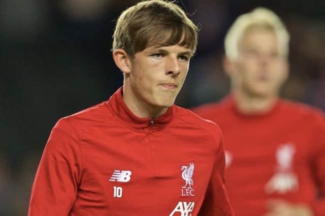 Midfielder Leighton Clarkson warms up ahead of the Carabao Cup tie away at MK Dons Photo: Liverpool FC