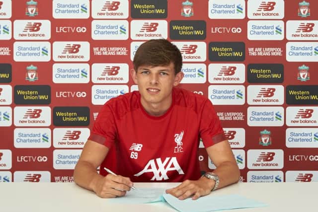 Leighton Clarkson signs his pro contract at The Academy, 01/07/19.
Photo: Nick Taylor/LFC