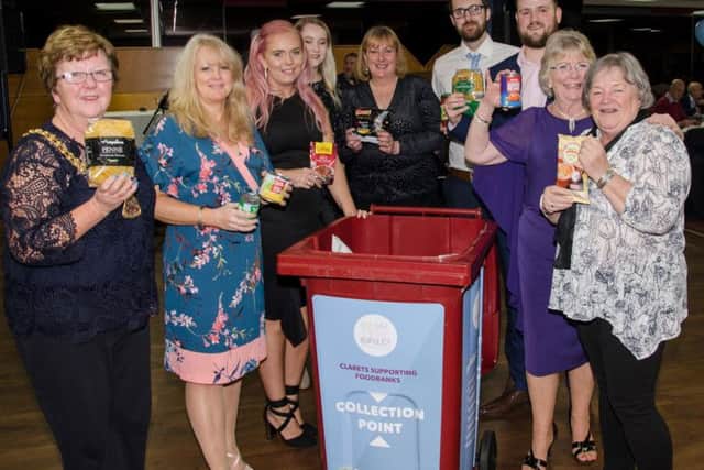 Mayor of Burnley Coun. Anne Kelly and other guests donating to the foodbank. Pic: Ian Bannister