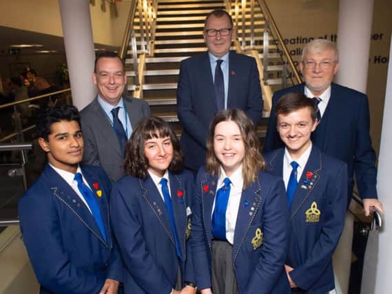 Some of the award winning students with headteacher Mr Richard Varey, Mr Coady and chairman of the governors Mr Ken Tyson. (Photo by Andy Ford)