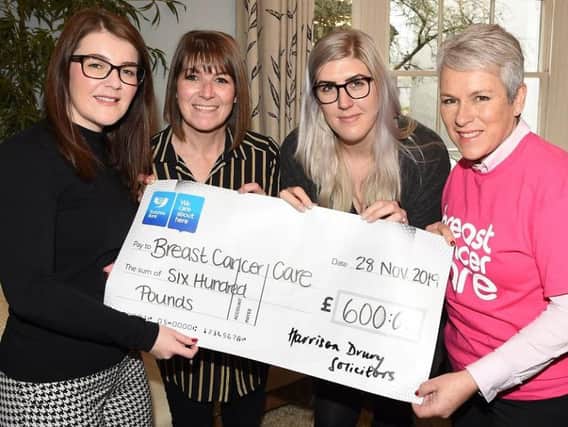 Nicola, Jackie, Lucy and Wendy at the cheque handover