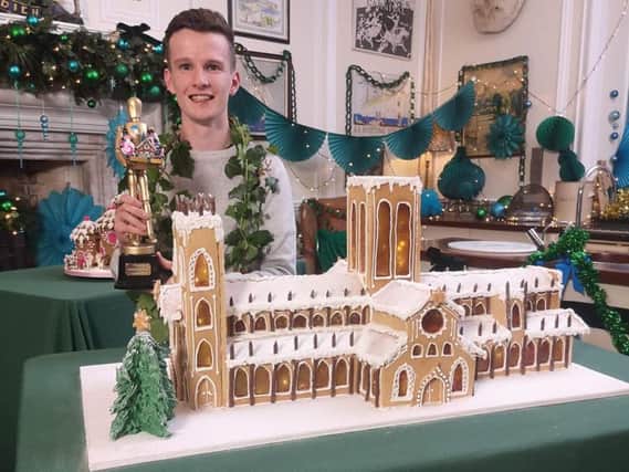Stephen Harrison with his stunning gingerbread creation of York Minster