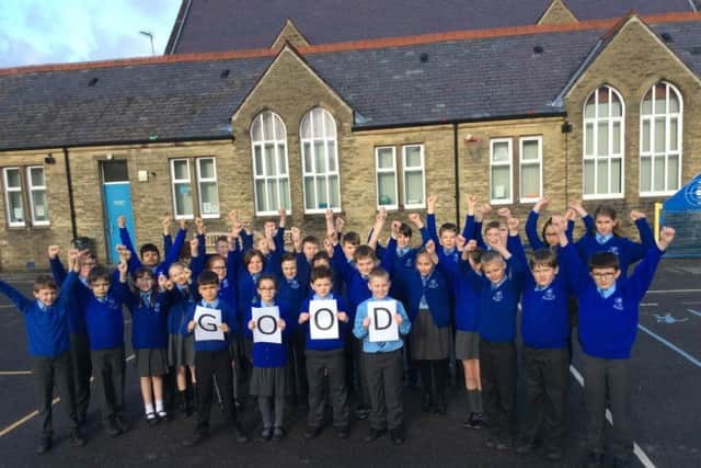 Pupils celebrate their most recent Ofsted report
