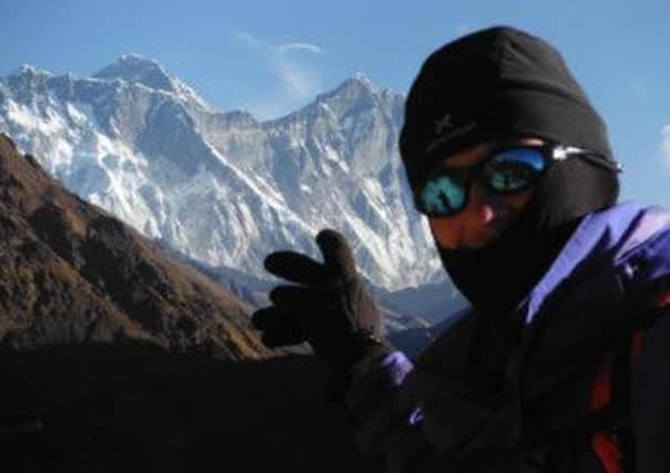 AINT NO MOUNTAIN HIGH ENOUGH: Gavin Roper surveys the highest peak ihn the world, Mount Everest