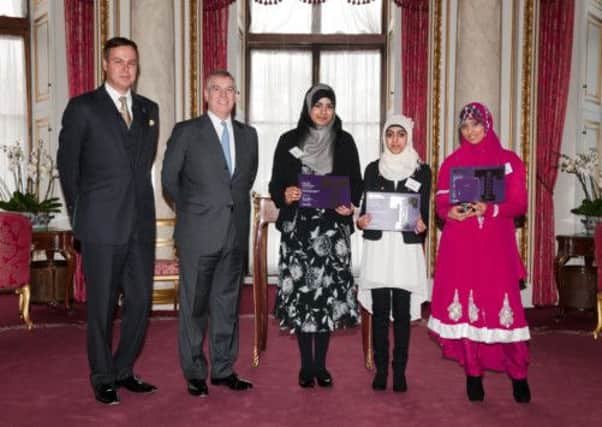 Left to right, Peter Jones CBE, HRH The Duke of York, Irham Sajid, Aneesa Riaz and Ameena Bibi at Buckingham Palace (S)