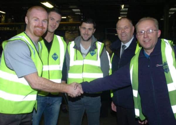 Burnley FC manager, Sean Dyche and players Jason Shackell and Charlie Austin meet with VEKA managing director, Dave Jones and VEKA employee, Keith Tempest during a visit.