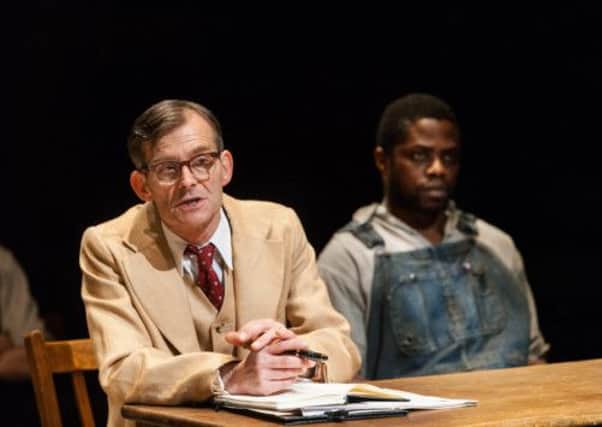 Nigel Cooke as Atticus Finch (left) and Okezei Morro as Tom Robinson in TO KILL A MOCKINGBIRD (Royal Exchange Theatre until 30 March). Photo - Jonathan Keenan