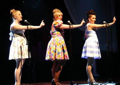 VINTAGE: A trio of singers bring a touch of retro glamour to the stage. (S)
