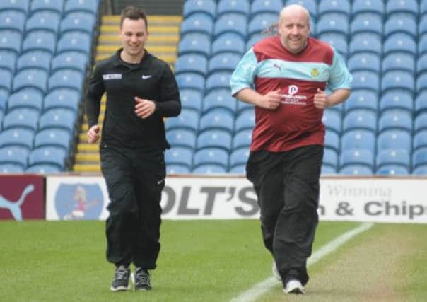 Jeff Brown in training for the Pennine Lancashire 10K run under the guidance of fitness coach Jamie Kennedy.