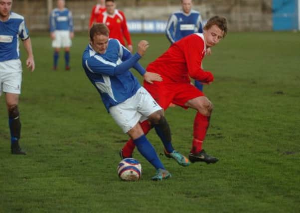 Martin Parkes pictured in action for Padiham FC.