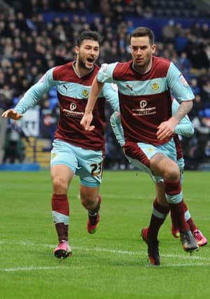 David Edgar celebrates his goal at Bolton back in February with Charlie Austin