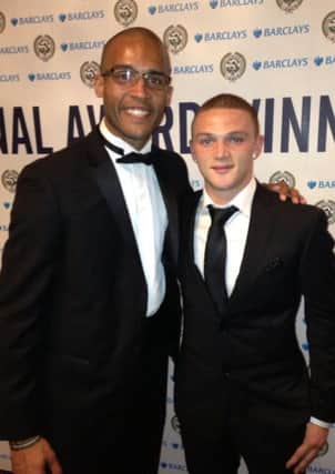 Kieran Trippier is pictured with PFA Chairman, and former Claret, Clarke Carlisle, at the PFA Awards on Sunday night