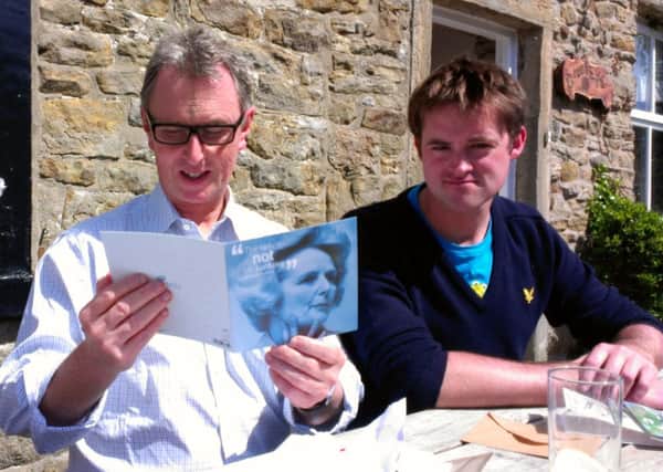 Ribble Valley MP Nigel Evans reads one of his message's of support written in a card featuring the late Baroness Thatcher.