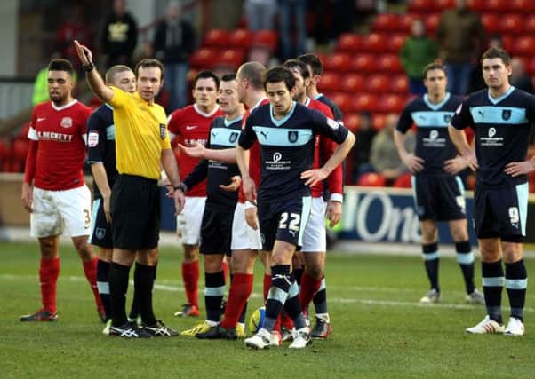 Brian Stock is a victim of mistaken identity as he receives his marching orders at Oakwell
