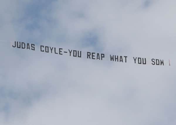 The banner with the message 'JUDAS COYLE - YOU REAP WHAT YOU SOW' which circled Turf Moor as the game kicked off.