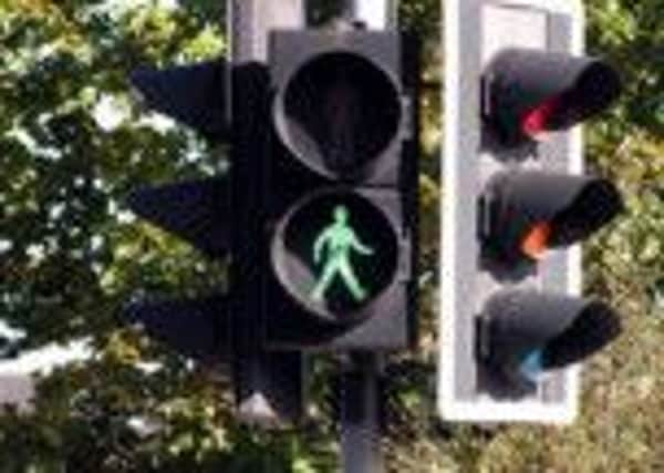 RED LIGHT: This combination of lights means motorists stop and I cross the road - surely everyone knows that?