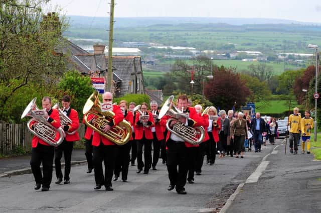 Read and Simonstone Procession of Witness makes its way from St Peter's in Simonstone to St John's in Read.
Photo Ben Parsons