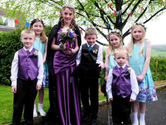 St Nicholas's Church Rose Queen Emily Rickard with her pageboy Harry Ricard and attendants Callum Dewhurst, Abigail Dewhurst, Sophie Bettes, Oscar Bailey and Hannah Bettes.
Photo Ben Parsons