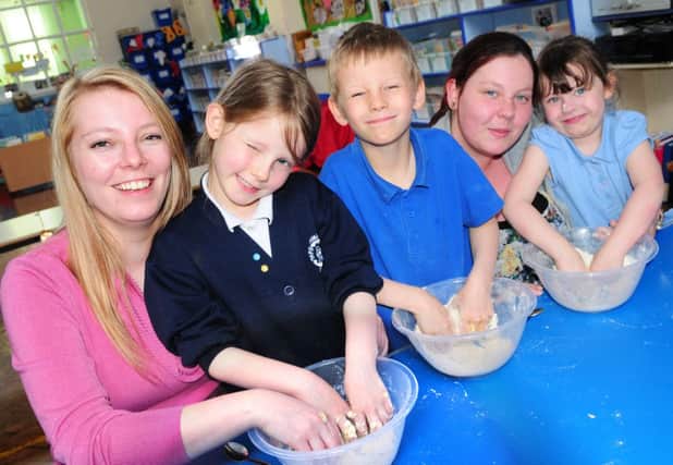 Cookery class for parents and children at Park Primary School in Colne.
Photo Ben Parsons