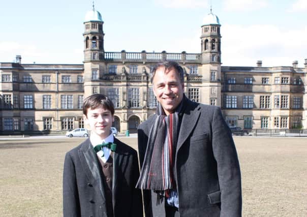 George Bonney as the young Conan Doyle, with author Anthony Horowitz at Stonyhurst College