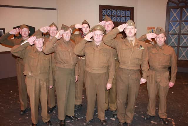 Pendle Hippodrome Theatre Company's "Dad's Army" team salute in colour.