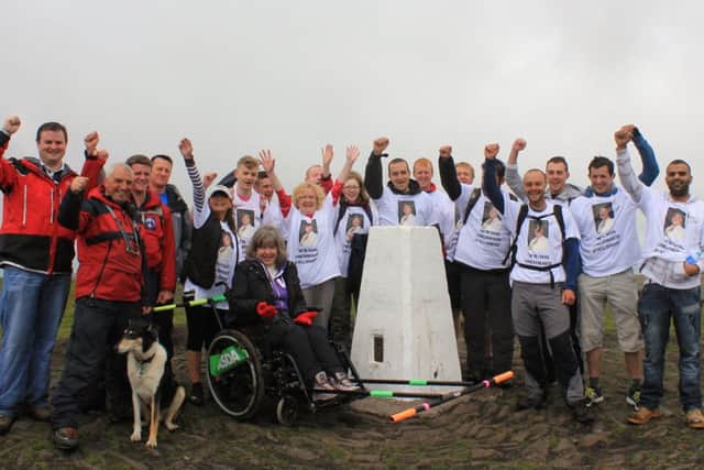 Rossendale and Pendle Mountain Rescue, Pendle MP Andrew Stephenson and the wheelchair support team give Lynne Drinkwater a big cheer.