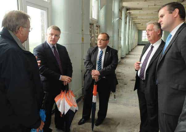 Government for Housing and Local Growth Mark Prisk talks about the regeneration plans for Brierfield Mill with Pendle Council chief executive Stephen Barnes, Leader of Pendle Council, Coun. Joe Cooney, Pendle MP Andrew Stephenson and Barnfield Construction MD Tim Webber.