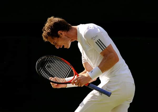 Andy Murray celebrates during his match against Russia's Mikhail Youzhny at Wimbledon. Photo: Andrew Matthews/PA Wire.