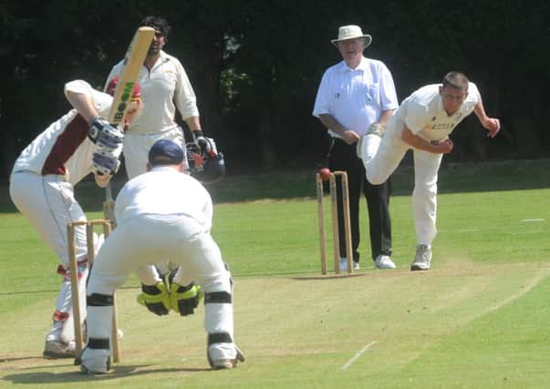 IN ACTION: Padiham bowler Steve Meehan bowling against Barnoldswick on Saturday