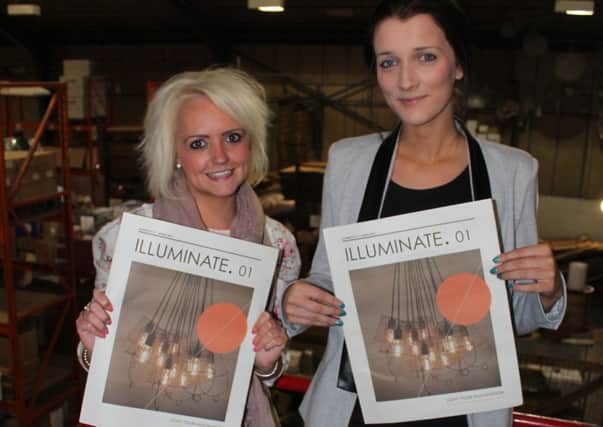 BRIGHT TIMES: Project co-ordinators Harriet Holly and Jodie Rawes show off the new Illuminate newspaper at Chantelle Lighting