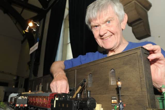 Albert Wilkinson from the Blackburn and East Lancs Model Railway Society with his model of Oswaldtwistle Town railway station at the exhibition at St Mary's Hall.