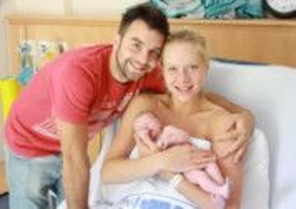 As precious as a prince! Baby Sonny  with proud parents Amy and Alex. (s)