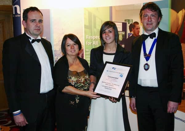 Matthew Alston's parents, Andrew and Janet Alston (left), pictured with Rhiannon Leeds, Safer Travel Adviser at Lancashire County Council, receiving their award from Richard Manock, chairman of the North Western branch of the Chartered Institute of Highways and Transportation (right).