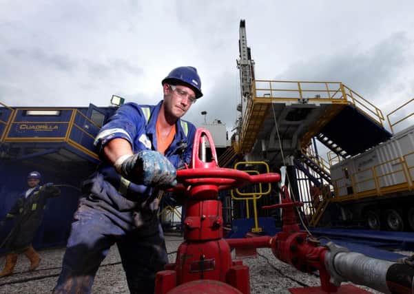 Photo: Gabriel Szabo/Guzelian - A worker at Cuadrilla Resources' fracking plant near Preston, Lancashire. Cuadrilla has been given the go-ahead to resume fracking operations in Lancashire after a ban on the controversial process of shale gas exploration was lifted by the Government.