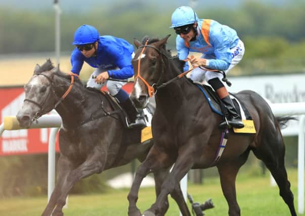 Toormore (right) ridden by Richard Hughes beats outstrip to win The Veuve Clicquot Vintage Stakes during day two of Glorious Goodwood at Goodwood Racecourse. Photo: Mike Egerton/PA Wire