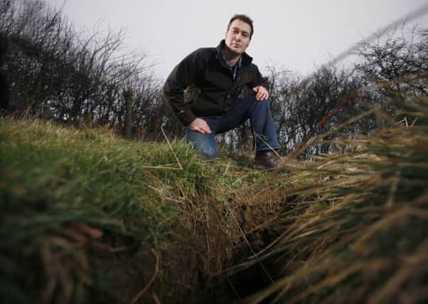 Picture: Lorne Campbell /Guzelian Robert Fuller next  to a hole from where badgers were pulled out of the ground in  North Yorkshire by baiters.