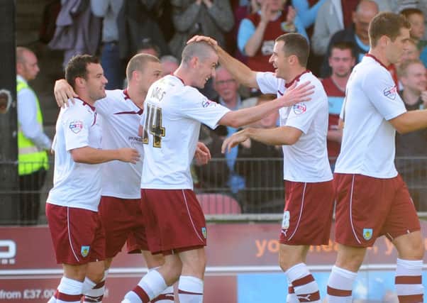 Burnley's David Jones (third in from left) celebrates scoring the opening goal with team-mate Dean Marney  (Photo by Chris Vaughan/CameraSport)