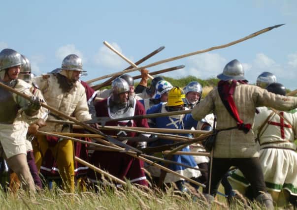 LET BATTLE COMMENCE: The re-enactment at the Flodden and 16th century discovery weekend, by EFL students Theo and Nathan