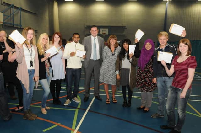Nelson & Colne College students celebrate with their A-Level results.