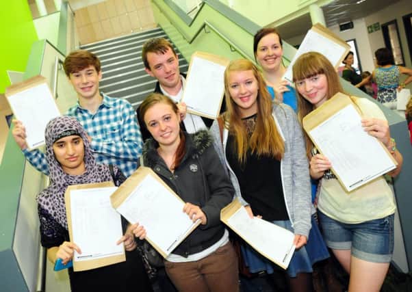 Successful students receive their A-Level results at Thomas Whitham Sixth Form, Burnley Campus.
Photo Ben Parsons