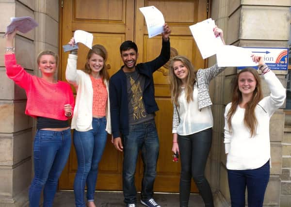 CRGS SIxth Form Centre students Bethany Dugmore, Amelia Cottam, Nabeel Jogee, Rebecca Winkley and Bethany Widdup celebrate getting their A Level results.