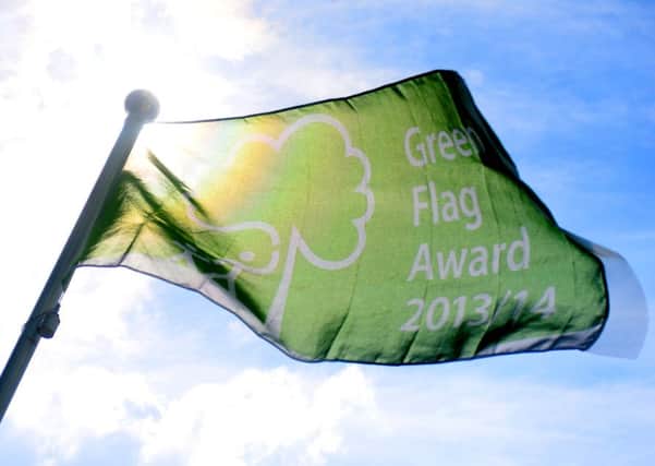 Green flag: national scheme celebrating the best green spaces.