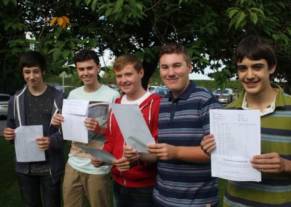 Pupils at St Augustine's RC High School at Billington celebrate receiving their GCSE results. From left to right, Alexander Agius, Harry Ashworth, Isaac Fielding, Tim Clarkson and Martin Smith. (s)
