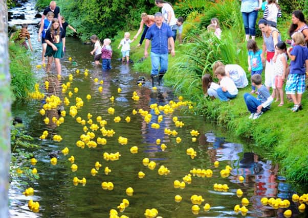 Pictures of the annual Duck race in Sabden which started at Bull Bridge then down the brook, past the playing fields and finished at the bridge opposite St Mary's Church, Whalley Road. Sabden 25.08.2013